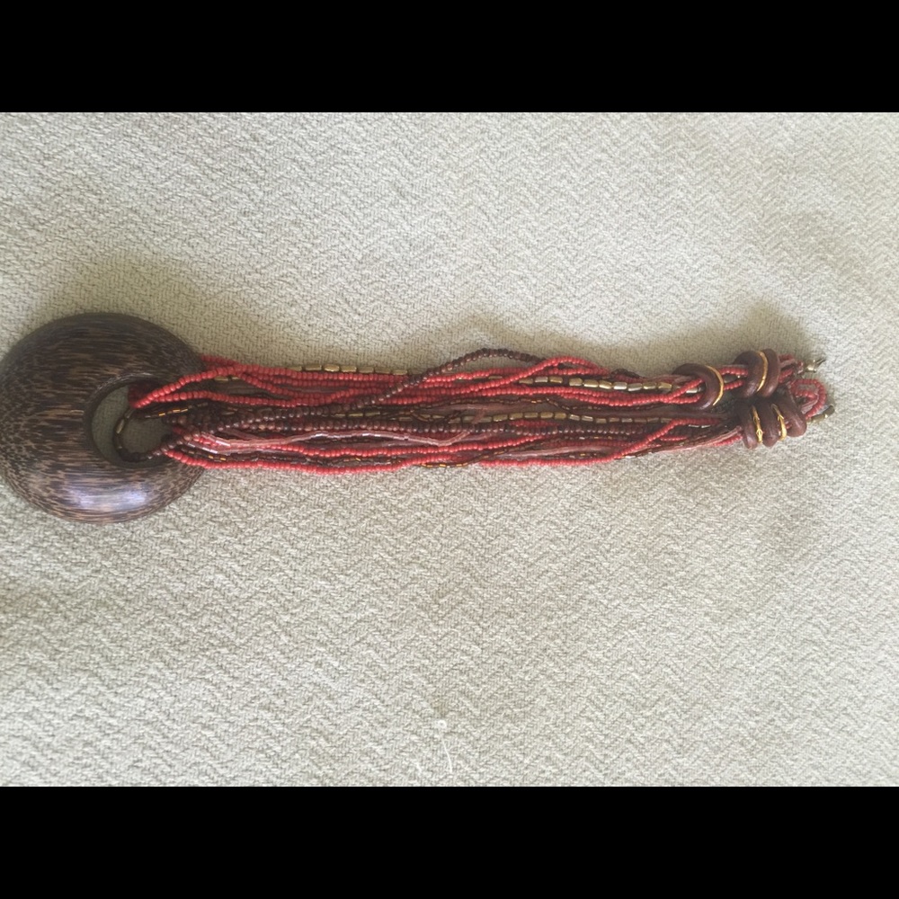 Necklace. Orange/brown colors. Wood medallion - Picture 2 of 6